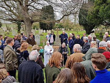 Photograph of the dedication of a bench at St Helen's in memory of Penelope Simpson Easter Sunday 2018